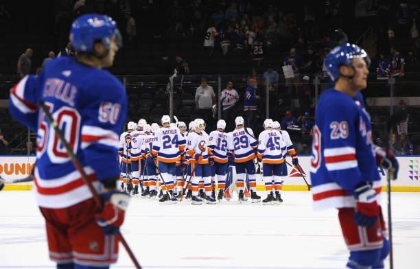 The New York Islanders celebrate their 4-0 shutout against the New York Rangers in a preseason game at Madison Square Garden on September 26, 2021 in...