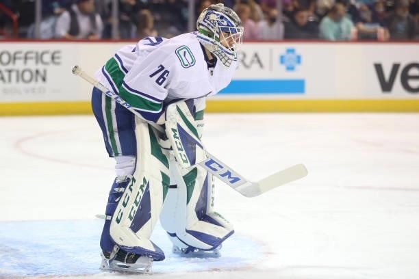 Arturs Silovs of the Vancouver Canucks looks on against the Seattle Kraken during the first period of a preseason game at Spokane Veterans Memorial...
