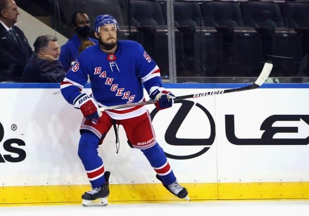 Ryan Lindgren of the New York Rangers skates against the New York Islanders in a preseason game at Madison Square Garden on September 26, 2021 in New...