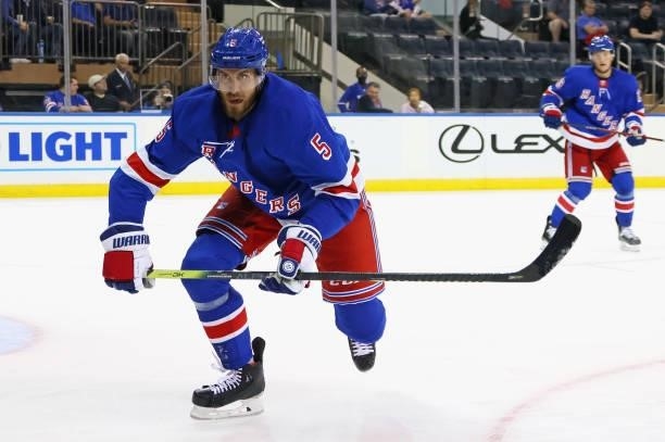 Jarred Tinordi of the New York Rangers skates against the New York Islanders in a preseason game at Madison Square Garden on September 26, 2021 in...