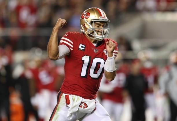 Jimmy Garoppolo of the San Francisco 49ers celebrates after a touchdown during the second half against the Green Bay Packers in the game at Levi's...