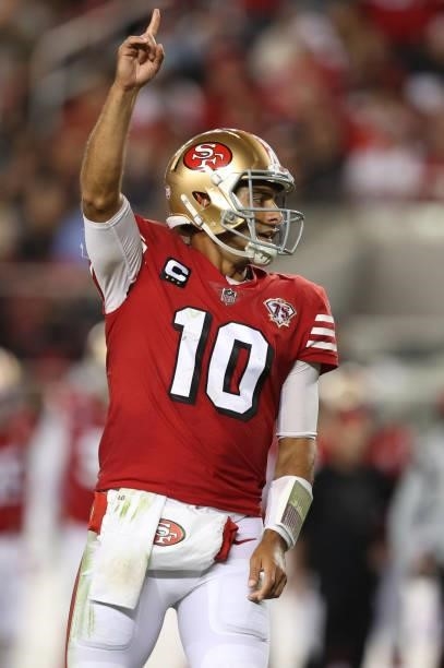 Jimmy Garoppolo of the San Francisco 49ers celebrates after a touchdown during the second half against the Green Bay Packers in the game at Levi's...