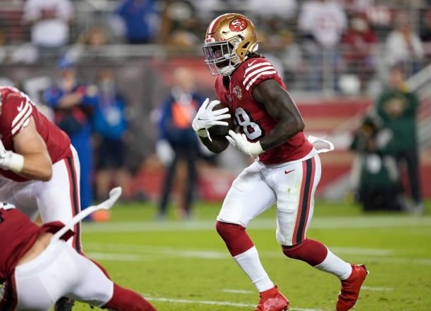 Trey Sermon of the San Francisco 49ers rushes during the second half against the Green Bay Packers in the game at Levi's Stadium on September 26,...