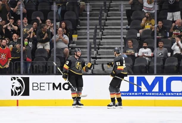 Paul Cotter of the Vegas Golden Knights celebrates after scoring a goal during the second period against the San Jose Sharks at T-Mobile Arena on...