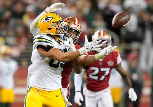 Fred Warner of the San Francisco 49ers is called for pass interference against Robert Tonyan of the Green Bay Packers during the second half in the...