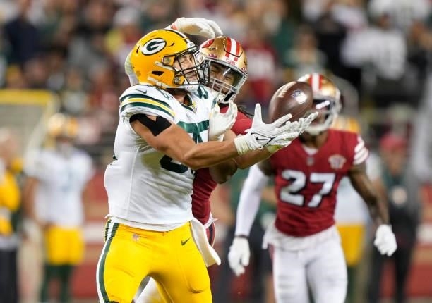 Fred Warner of the San Francisco 49ers is called for pass interference against Robert Tonyan of the Green Bay Packers during the second half in the...