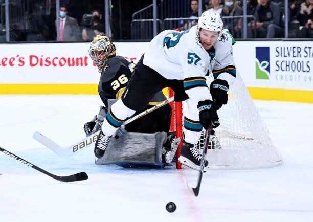 Adam Raska of the San Jose Sharks dives for the puck during the second period against the Vegas Golden Knights at T-Mobile Arena on September 26,...