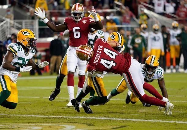 Kyle Juszczyk of the San Francisco 49ers scores a touchdown during the fourth quarter against the Green Bay Packers in the game at Levi's Stadium on...