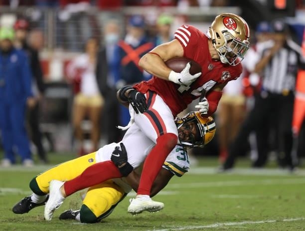 Kyle Juszczyk of the San Francisco 49ers scores a touchdown during the fourth quarter against the Green Bay Packers in the game at Levi's Stadium on...