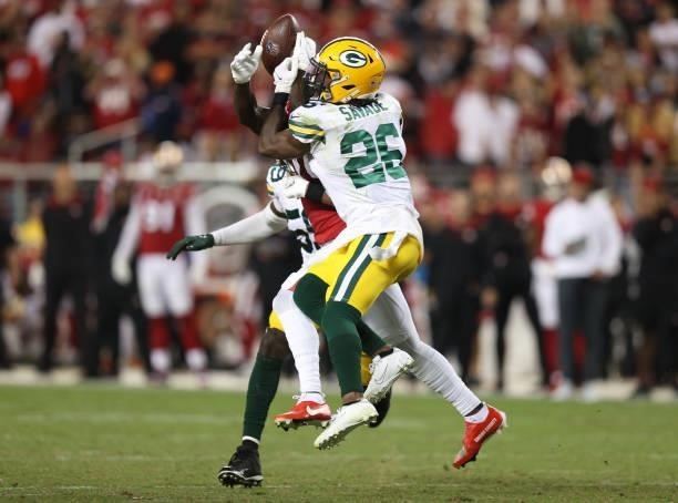 Darnell Savage of the Green Bay Packers breaks up a pass to Deebo Samuel of the San Francisco 49ers during the fourth quarter in the game at Levi's...