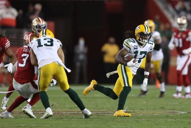 Davante Adams of the Green Bay Packers runs after catching a pass during the fourth quarter against the San Francisco 49ers in the game at Levi's...