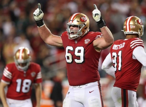 Mike McGlinchey of the San Francisco 49ers celebrates after a touchdown during the fourth quarter against the Green Bay Packers in the game at Levi's...