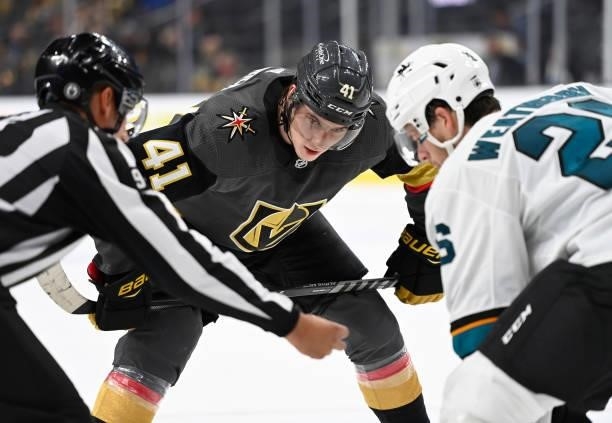 Nolan Patrick of the Vegas Golden Knights faces off with Jasper Weatherby of the San Jose Sharks during the third period at T-Mobile Arena on...