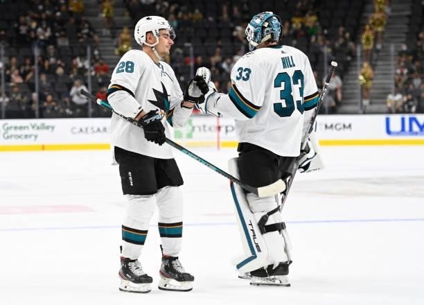 The San Jose Sharks celebrate after defeating the Vegas Golden Knights at T-Mobile Arena on September 26, 2021 in Las Vegas, Nevada.