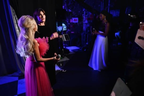 Kristin Chenoweth and Idina Menzel perform onstage during the 74th Annual Tony Awards at Winter Garden Theatre on September 26, 2021 in New York City.