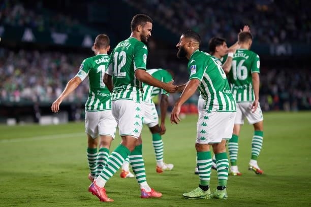 Willian Jose of Real Betis celebrates scoring his teams first goal with team mates during the LaLiga Santander match between Real Betis and Getafe CF...