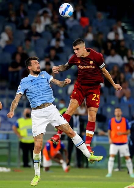 Francesco Acerbi of SS Lazio head the ball against Gianluca Mancini of AS Roma ,during the Serie A match between SS Lazio and AS Roma at Stadio...