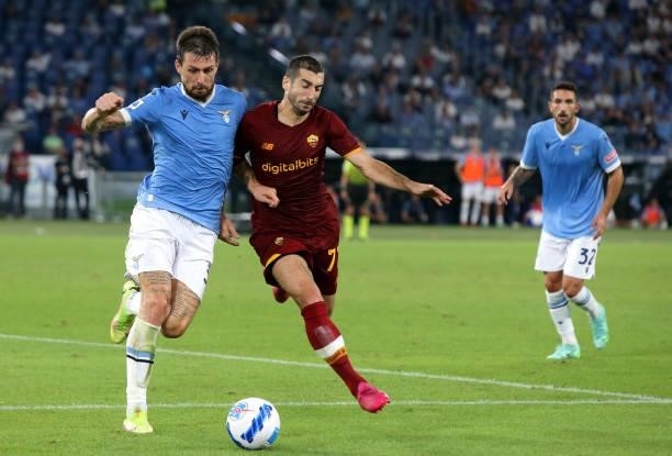 Francesco Acerbi of SS Lazio competes for the ball with Henrik Mkhitaryan of AS Roma ,during the Serie A match between SS Lazio and AS Roma at Stadio...