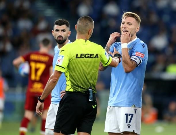 Ciro Immobile of SS Lazio argues with Italian Referee Marco Guida ,during the Serie A match between SS Lazio and AS Roma at Stadio Olimpico on...