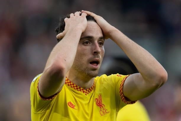 Diogo Jota of Liverpool reacts during the Premier League match between Brentford and Liverpool at Brentford Community Stadium on September 25, 2021...