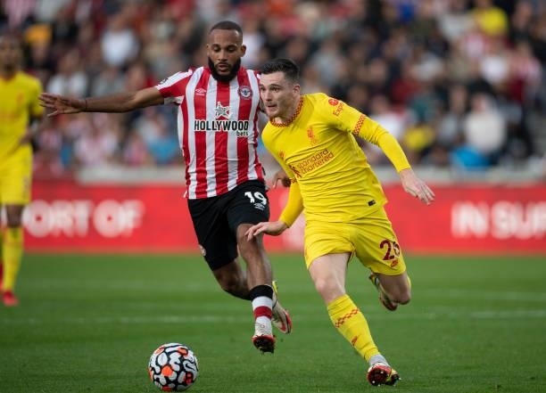 Bryan Mbeumo of Brentford and Andy Robertson of Liverpool during the Premier League match between Brentford and Liverpool at Brentford Community...