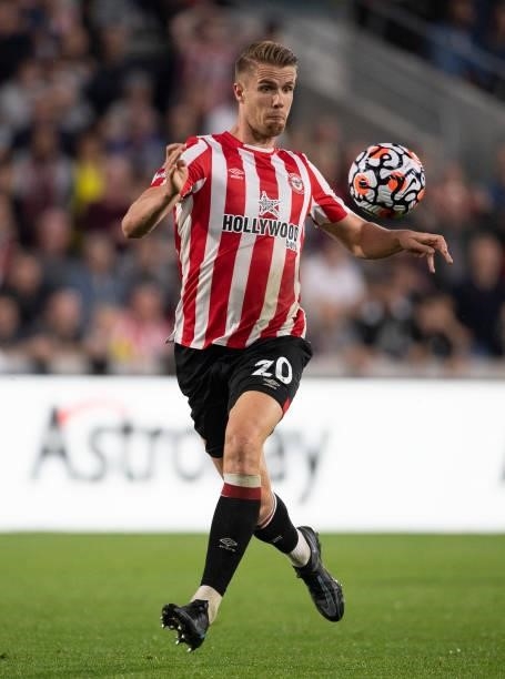 Kristoffer Ajer of Brentford during the Premier League match between Brentford and Liverpool at Brentford Community Stadium on September 25, 2021 in...