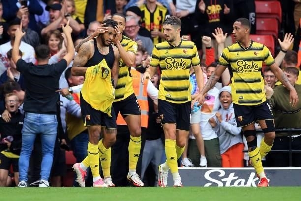 Joshua King of Watford celebrates prior his goal to be disallowed by VAR for offside during the Premier League match between Watford and Newcastle...