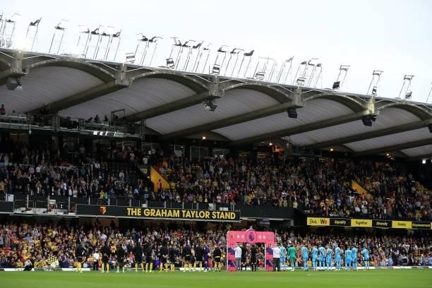 Players line up during the Premier League match between Watford and Newcastle United at Vicarage Road on September 25, 2021 in Watford, England.