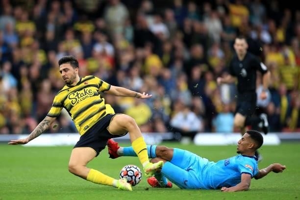 Isaac Hayden of Newcastle United and Ozan Tufan of Watford during the Premier League match between Watford and Newcastle United at Vicarage Road on...