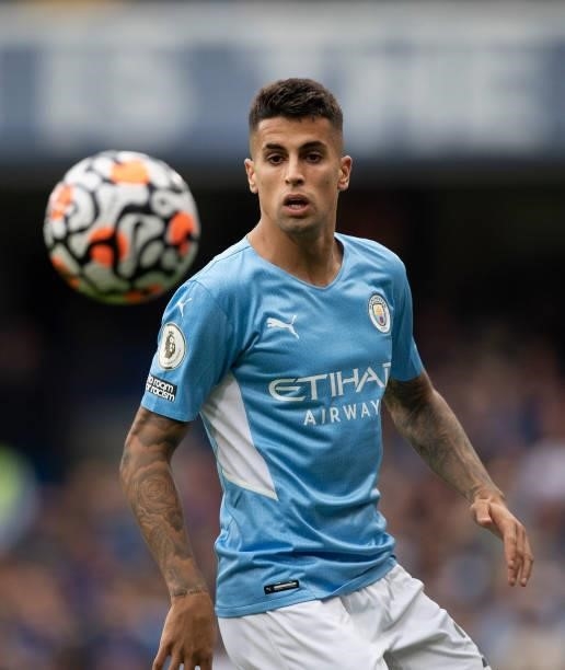 João Cancelo of Manchester City during the Premier League match between Chelsea and Manchester City at Stamford Bridge on September 25, 2021 in...