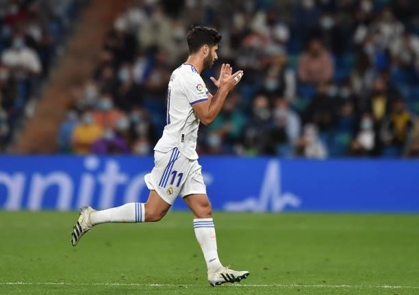 Marco Asensio of Real Madrid applauds while being substituted during the La Liga Santander match between Real Madrid CF and Villarreal CF at Estadio...