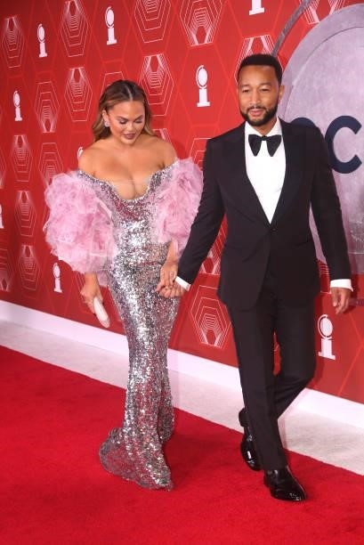 Chrissy Teigen and John Legend attend the 74th Annual Tony Awards at Winter Garden Theater on September 26, 2021 in New York City.