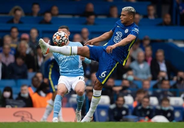 Thiago Silva of Chelsea and Phil Foden of Manchester City during the Premier League match between Chelsea and Manchester City at Stamford Bridge on...