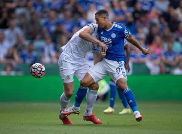 Youri Tielemans of Leicester City and Charlie Taylor of Burnley in action during the Premier League match between Leicester City and Burnley at The...