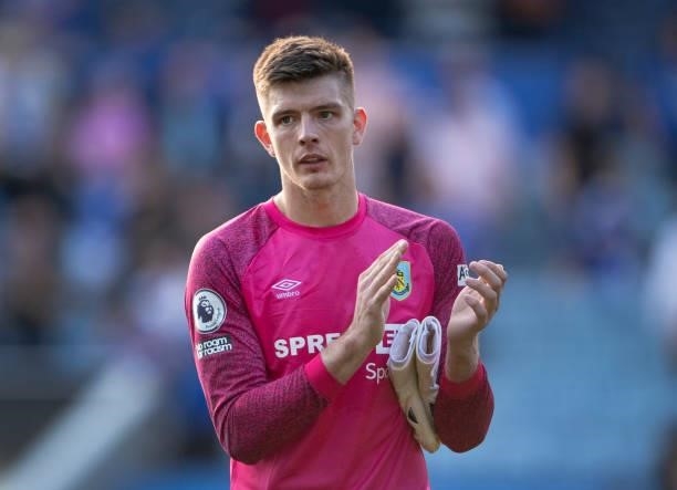 Burnley goalkeeper Nick Pope applauds the fans after the Premier League match between Leicester City and Burnley at The King Power Stadium on...