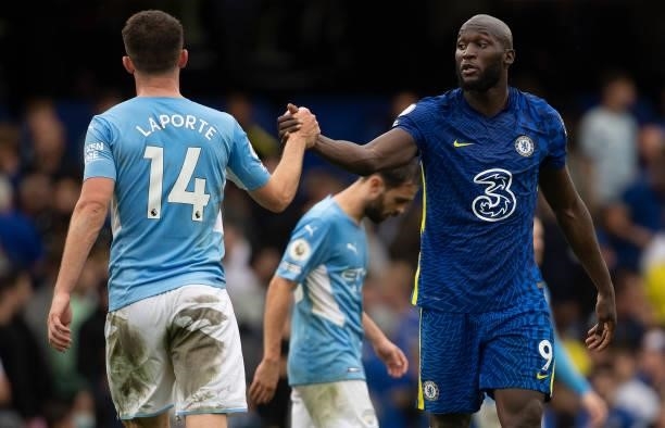 Romelu Lukaku of Chelsea and Aymeric Laporte of Manchester City shake hands after the Premier League match between Chelsea and Manchester City at...