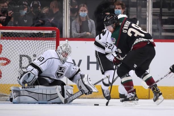 Goaltender Calvin Petersen of the Los Angeles Kings prepares to make a save on Liam O'Brien of the Arizona Coyotes during the first period of the...