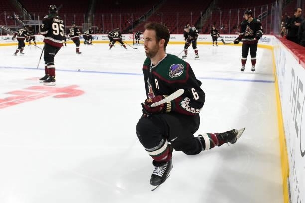 Andrew Ladd of the Arizona Coyotes stretches before the game against the Los Angeles Kings at Gila River Arena on September 27, 2021 in Glendale,...