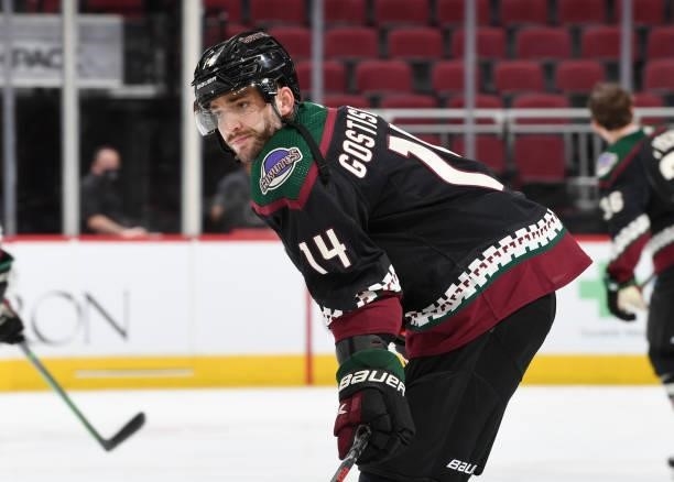 Shayne Gostisbehere of the Arizona Coyotes prepares for a game against the Los Angeles Kings at Gila River Arena on September 27, 2021 in Glendale,...