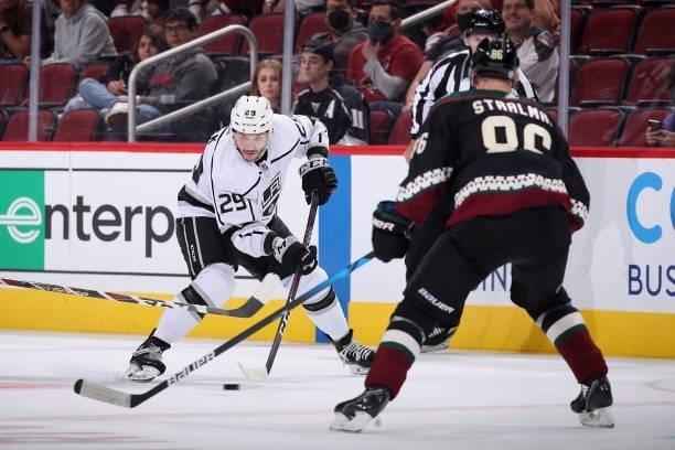 Martin Frk of the Los Angeles Kings skates with the puck against Anton Stralman of the Arizona Coyotes during the third period of the preseason NHL...