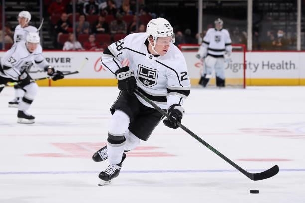 Jaret Anderson-Dolan of the Los Angeles Kings skates with the puck against the Arizona Coyotes during the third period of the preseason NHL game at...