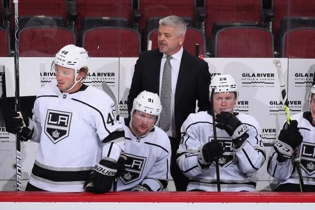 Head coach Todd McLellan of the Los Angeles Kings looks on from the bench during the third period of the preseason NHL game against the Arizona...