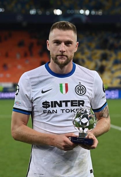 Milan Skriniar of FC Internazionale receives the award as player of the match at the end of the UEFA Champions League group D match between Shakhtar...