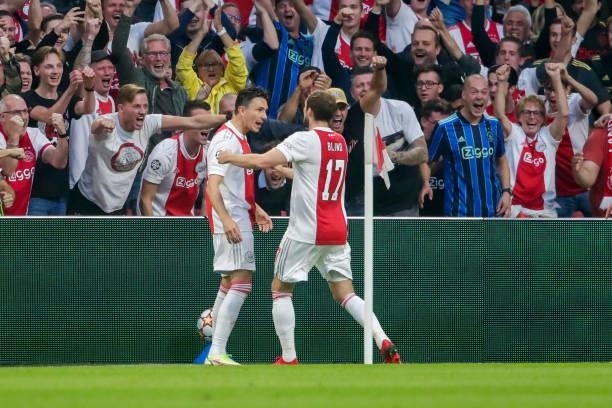 Steven Berghuis of Ajax is celebrating his goal, with Daley Blind of Ajax during the UEFA Champions League Group stage match between Ajax and...