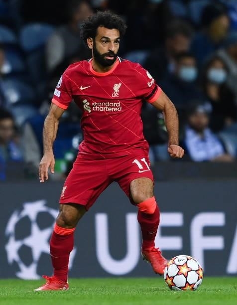 Mohamed Salah of Liverpool FC runs with the ball during the UEFA Champions League group B match between FC Porto and Liverpool FC at Estadio do...
