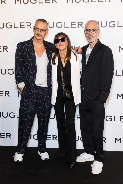 Designers Viktor Horsting, a guest and Rolf Snoeren attend the "Thierry Mugler : Couturissime