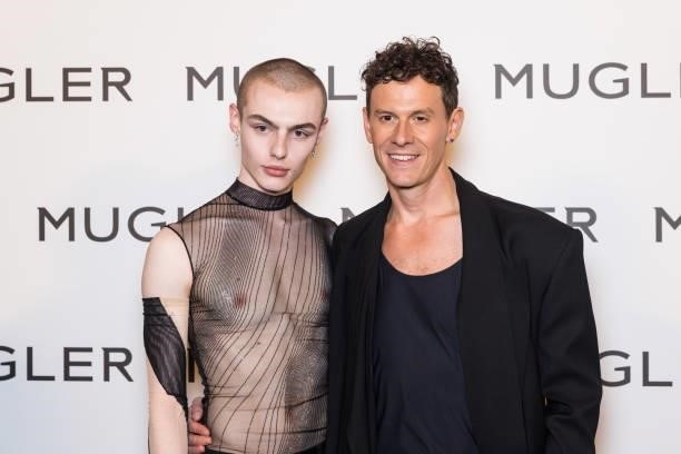 Guest and Casey Cadwallader attend the "Thierry Mugler : Couturissime