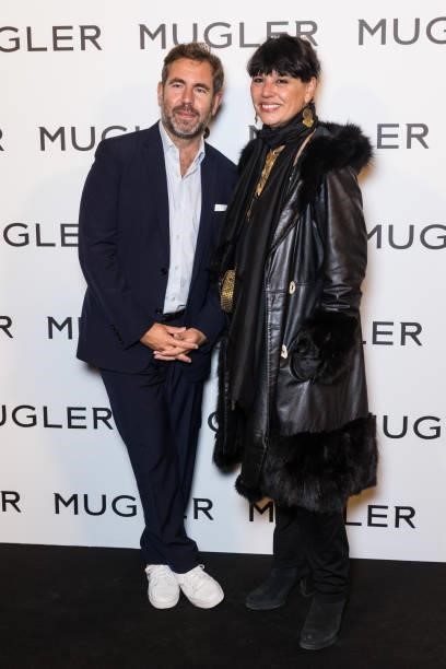 Olivier Gabet and a guest attend the "Thierry Mugler : Couturissime