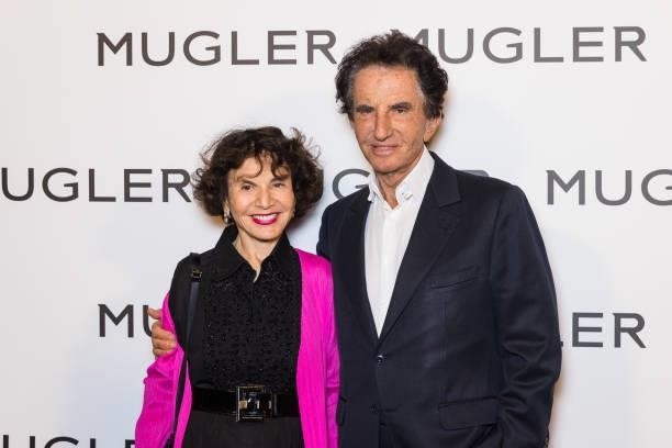 Monique Lang and Jack Lang attend the "Thierry Mugler : Couturissime