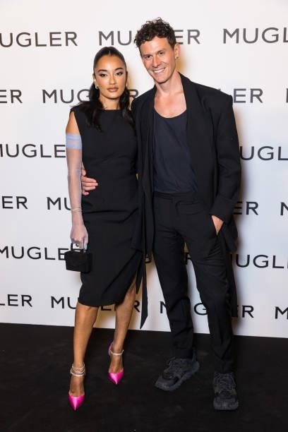 Amina Muaddi and Casey Cadwallader attend the "Thierry Mugler : Couturissime